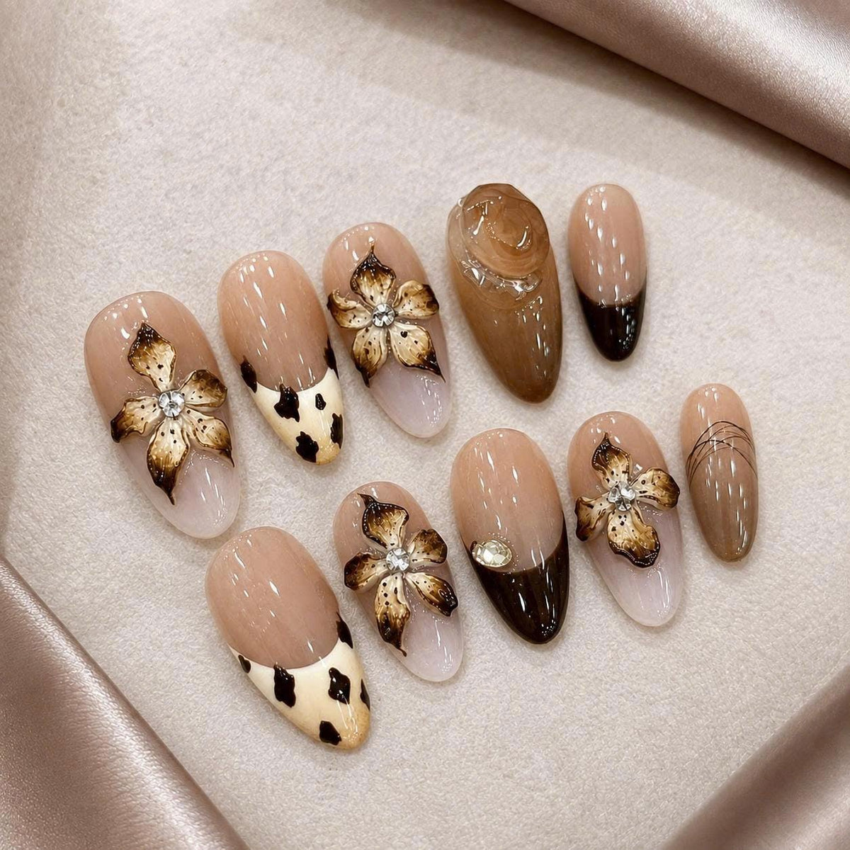 Brown Floral Press-On Nails – 3D Flower Almond – Cow Print French Tip