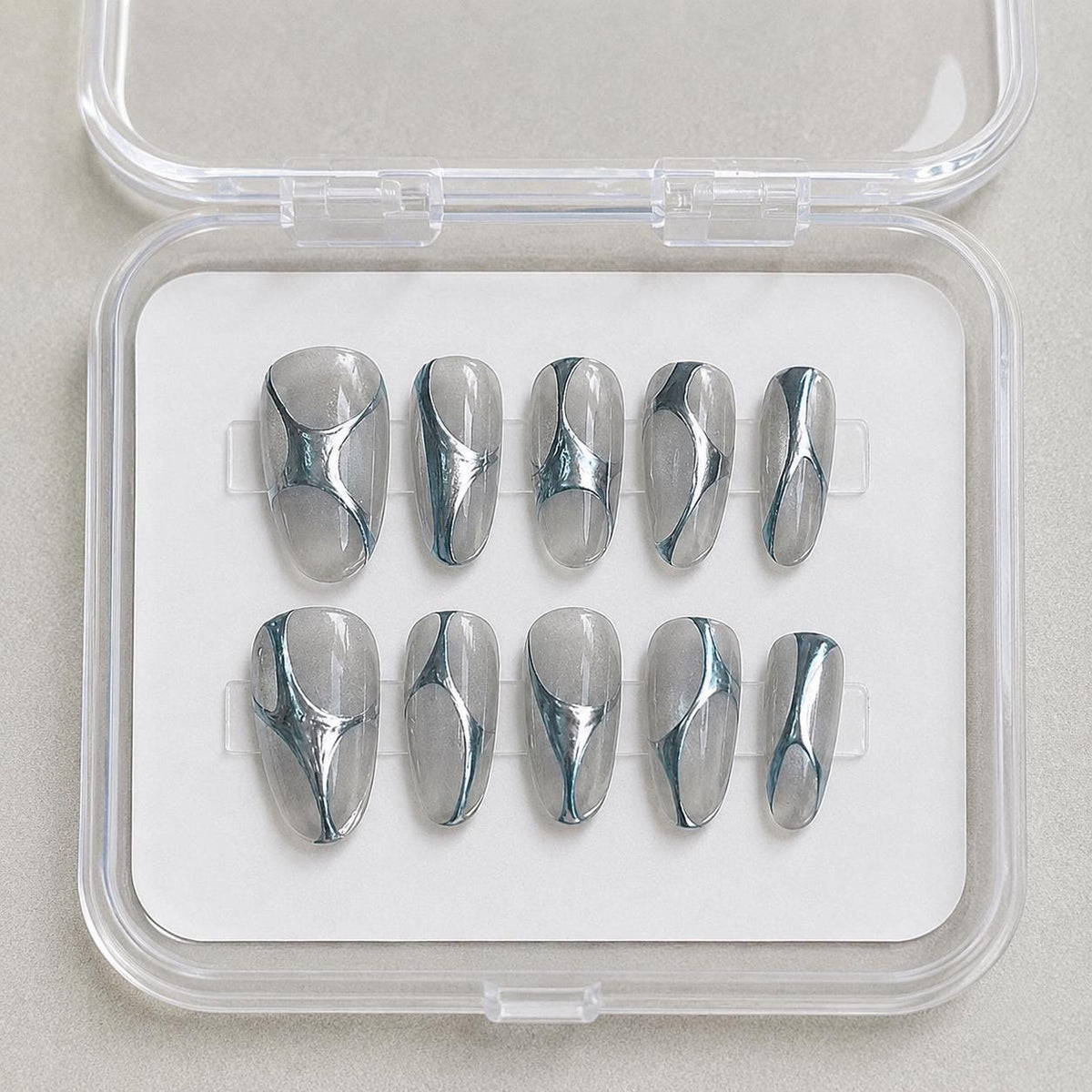 Silver Chrome Press-On Nails – Abstract 3D Metallic Almond – Clear Nude Chrome Swirl
