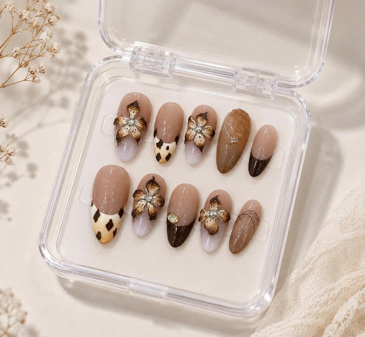 Brown Floral Press-On Nails – 3D Flower Almond – Cow Print French Tip