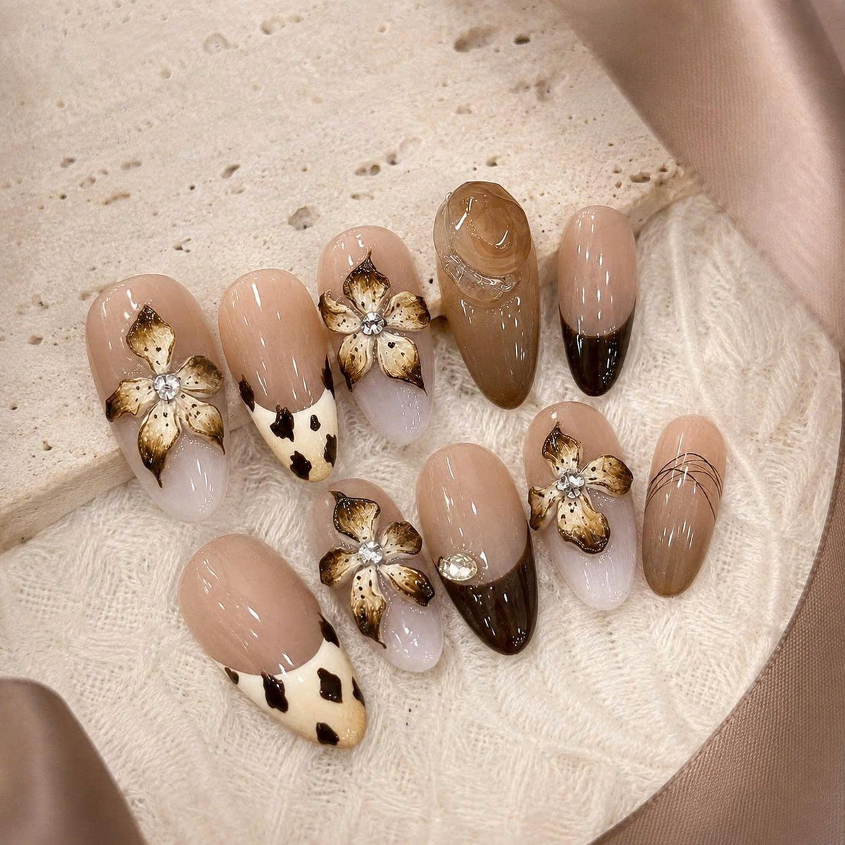 Brown Floral Press-On Nails – 3D Flower Almond – Cow Print French Tip