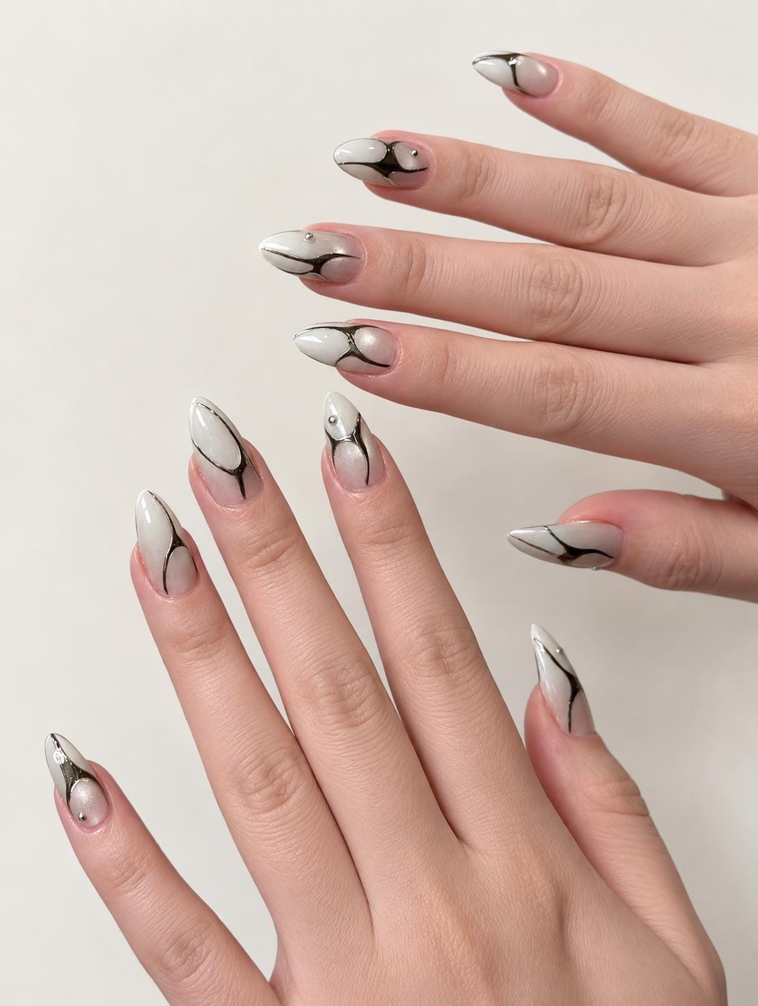 Silver Chrome Press-On Nails – White Almond – 3D Metallic Abstract Details